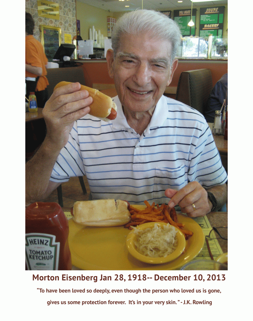 Morton Eisenberg eating a hotdog